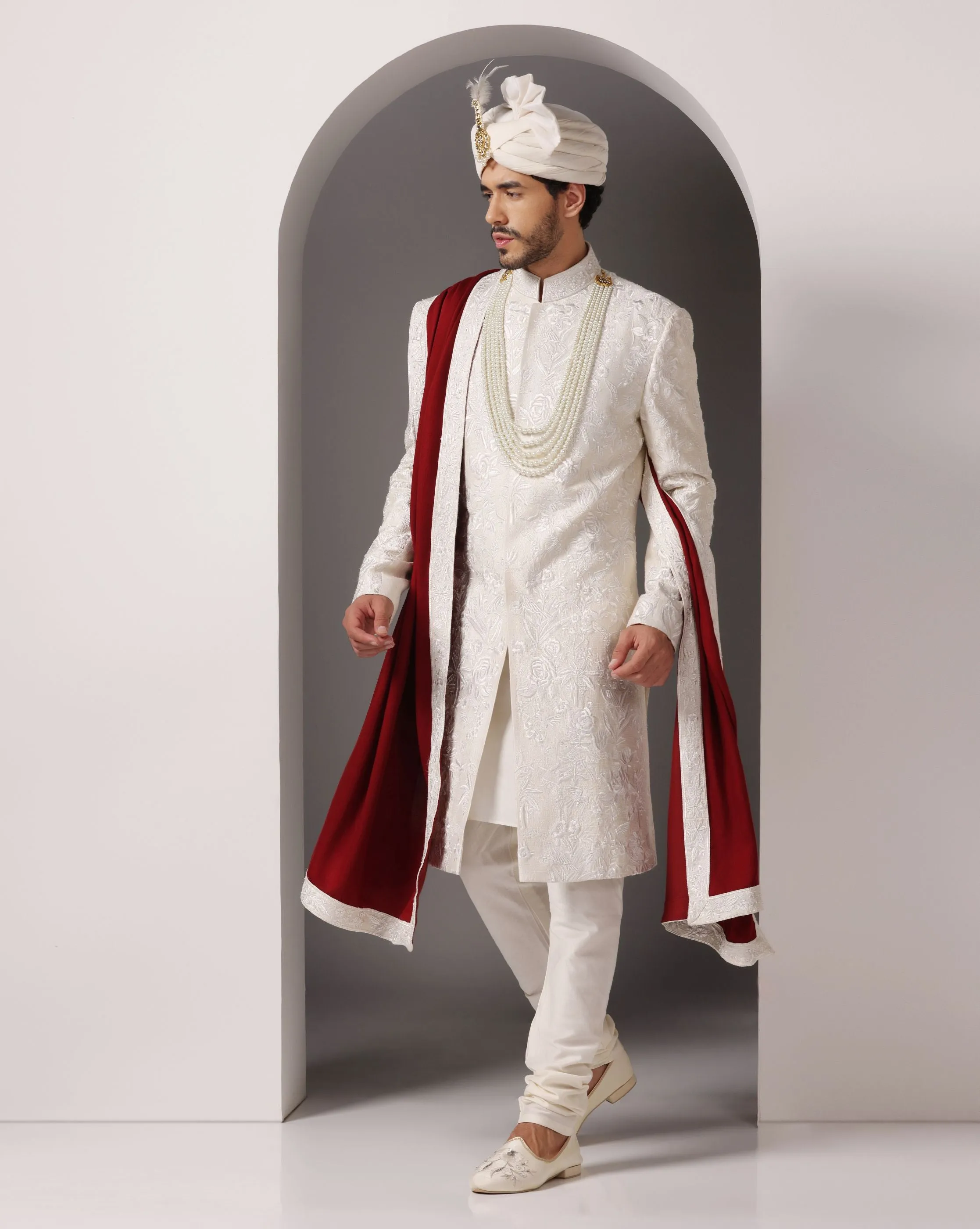 Ivory Grandeur: Sherwani with Subtle Tone-on-Tone Work and Handcrafted Embellishments